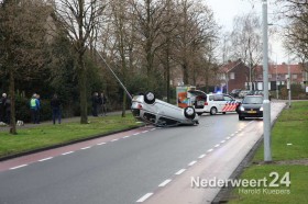 Auto over de kop Sint Jobstraat Weert